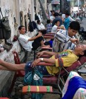 Outdoor hair dressing salon. Ho Chi Minh City, Vietnam